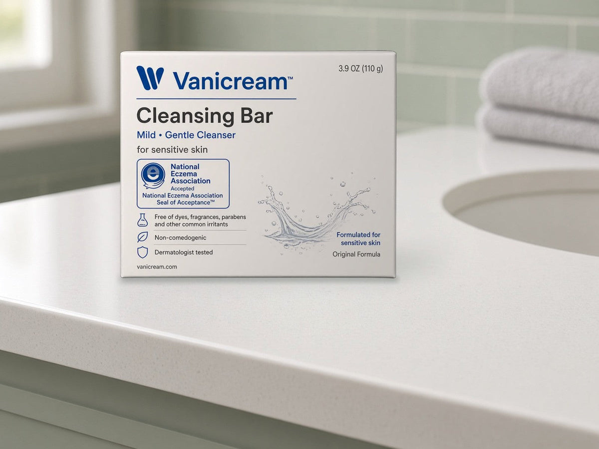 Vanicream Cleansing Bar 3.9 oz box standing on a white quartz bathroom vanity beside a sink in soft window light, product clearly in focus