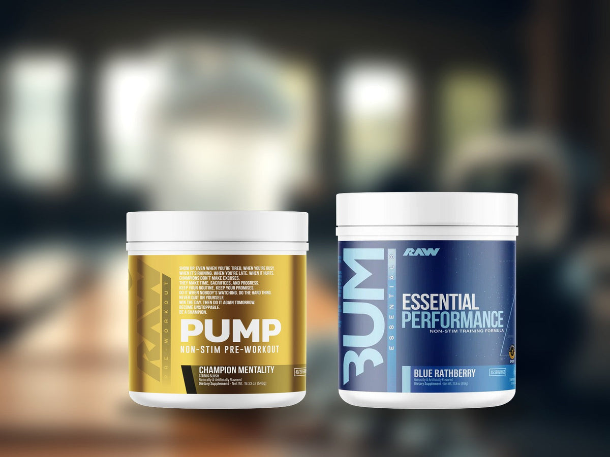RAW Pump Non-Stim Pre-Workout Champion Mentality tub and RAW Essential Performance Pre-Workout Blue Rathberry tub on a gym bench